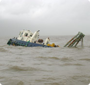 Re-floating the grounded tugboat