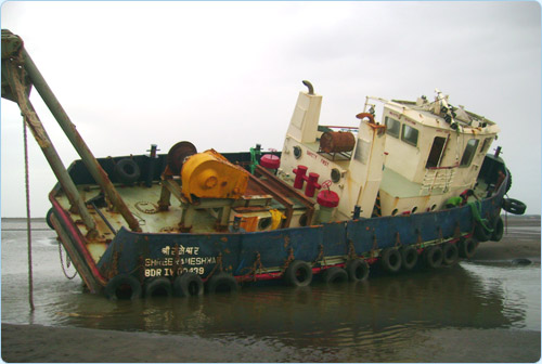 Re-floating the grounded tugboat